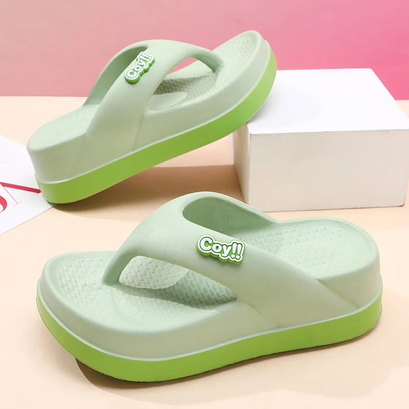 Height increasing beach slippers showing 2-3 inch discreet height boost