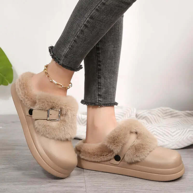 Side view of waterproof furry clogs showing thick bottom sole and EVA construction