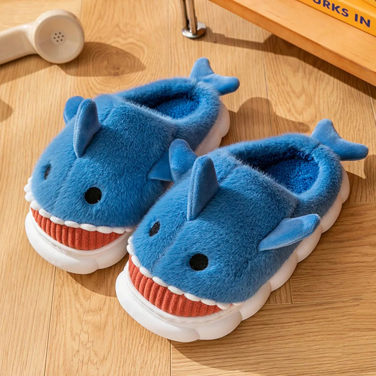 Cartoon shark slippers packaged as fun novelty gift for men