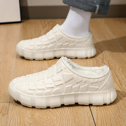Fleece-lined waterproof shoes in white, perfect for winter, showcasing comfortable and warm footwear for outdoor activities.