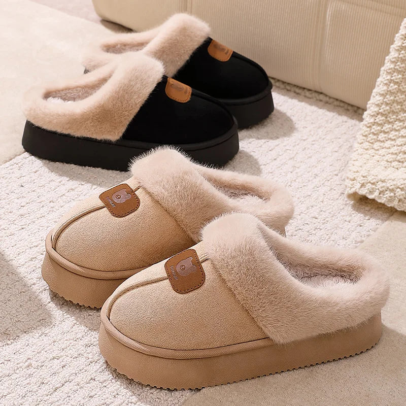 Plush cotton winter slippers on feet showing comfortable cozy winter fit