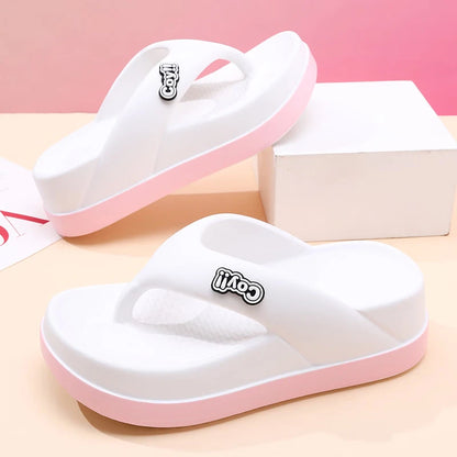 Height increasing beach slippers with hidden elevated platform and beach-ready design
