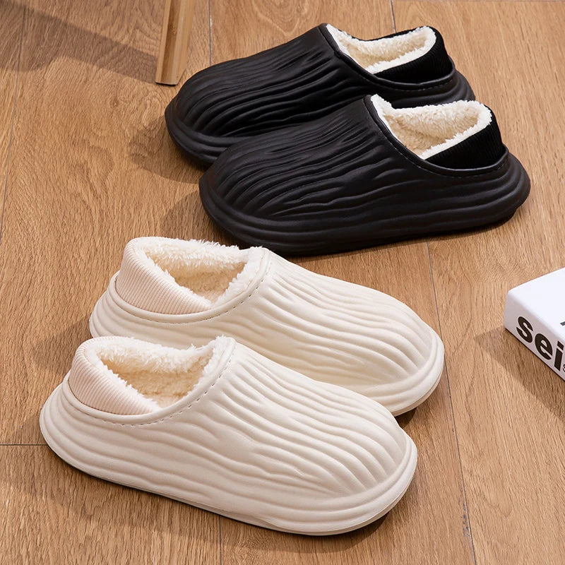 Women’s plush waterproof winter slippers in a stylish, quilted cream colorway