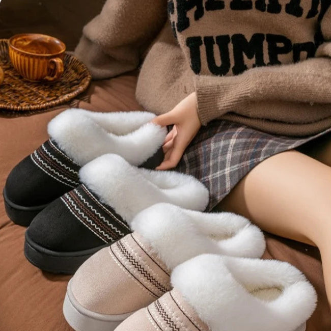 Close-up of warm plush indoor slippers with comfortable cushioned design