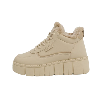 Beige winter sneaker with fur lining on a white background