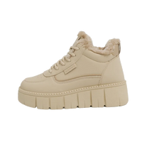 Beige winter sneaker with fur lining on a white background