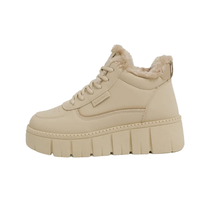 Beige winter sneaker with fur lining on a white background