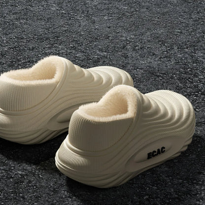 Side view of fur lined winter slippers showing waterproof EVA construction