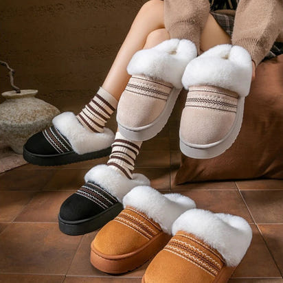 Women wearing cozy plush slippers indoors showing comfortable fit