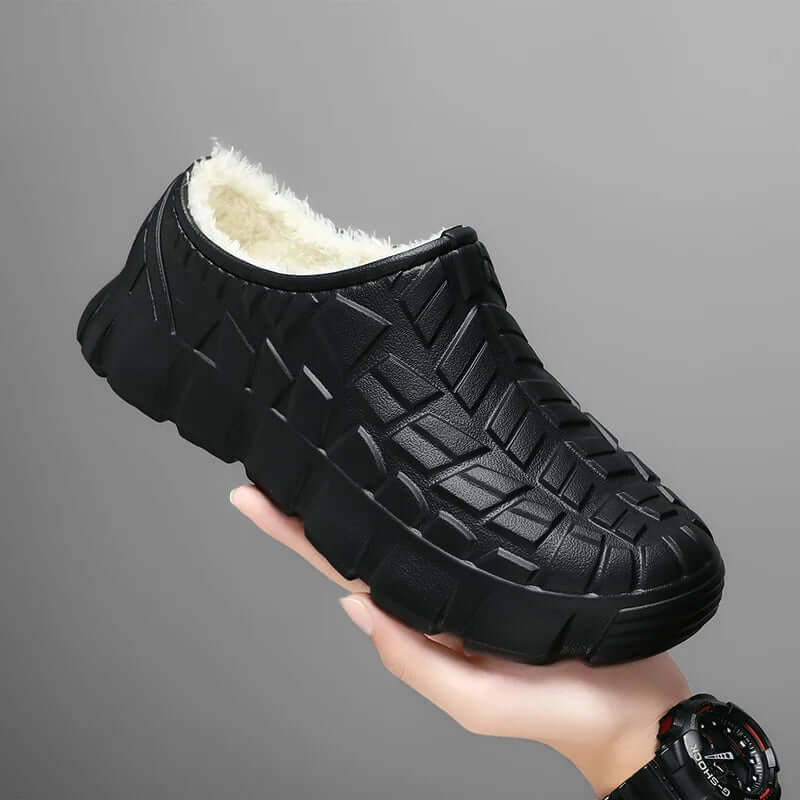 Fleece-lined waterproof shoes featuring a stylish black design, perfect for winter warmth and comfort.