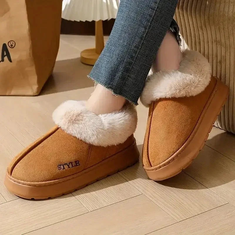 Tan suede slip-on best winter slippers with white faux fur trim
