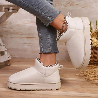 EvaCozy ultra-fluffy slippers featuring premium faux fur and cushioned comfort