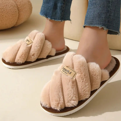 Pink fluffy slippers in solid color with flat heel and lightweight cushioned sole