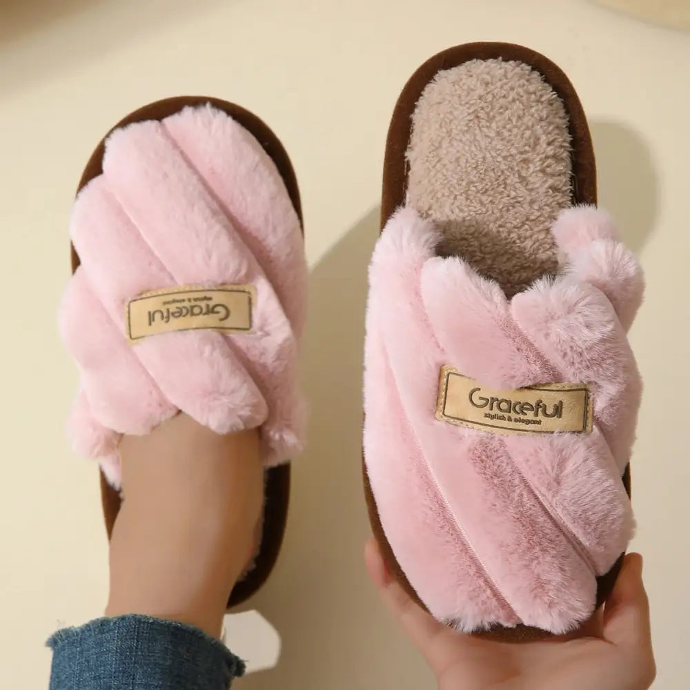 Pink fluffy slippers with lightweight cushioned sole and Graceful label