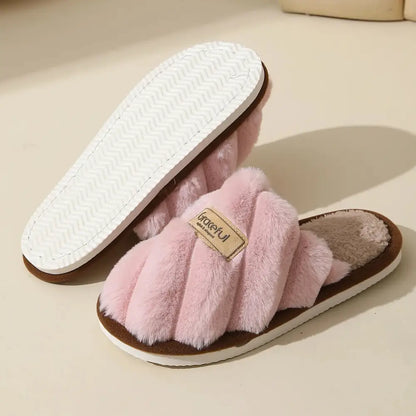Pink fluffy slippers in solid color with flat heel and lightweight cushioned sole