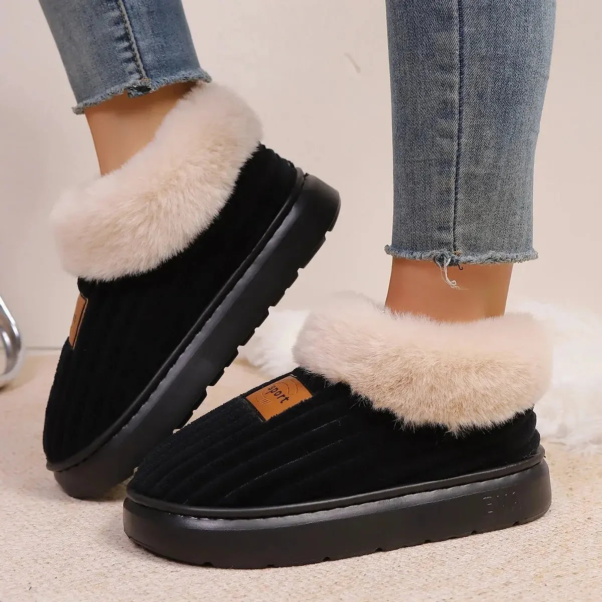 Plush winter slippers on feet showing warm comfortable fit