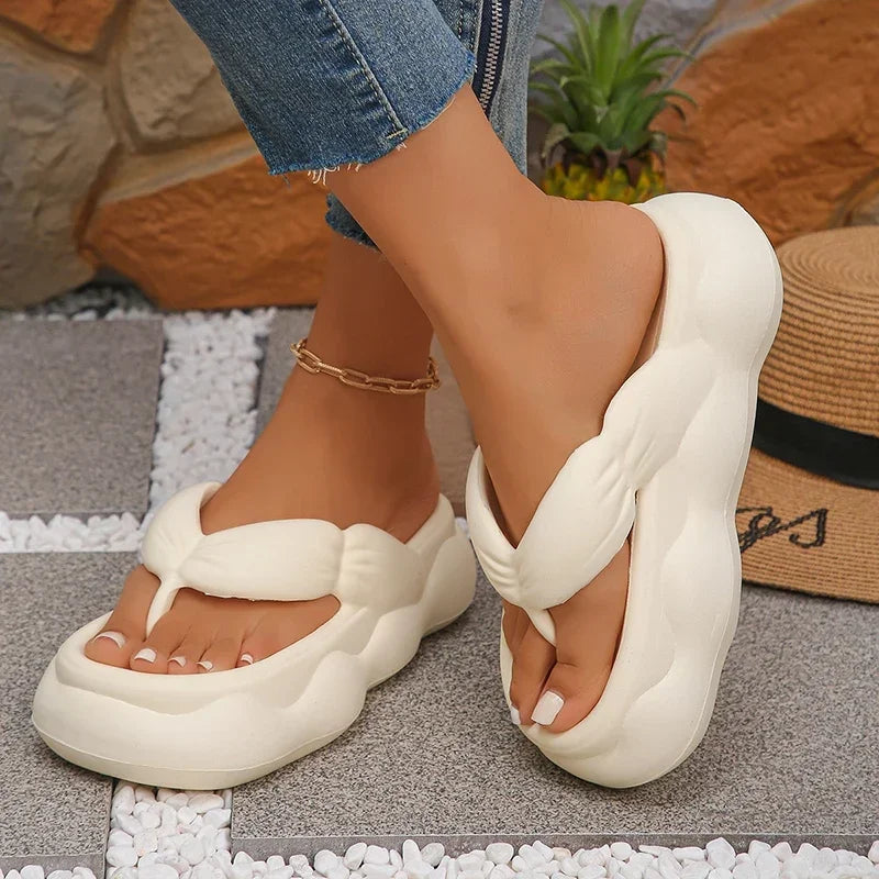 Women’s white platform flip flops in a crisp, clean matte minimalist white colorway